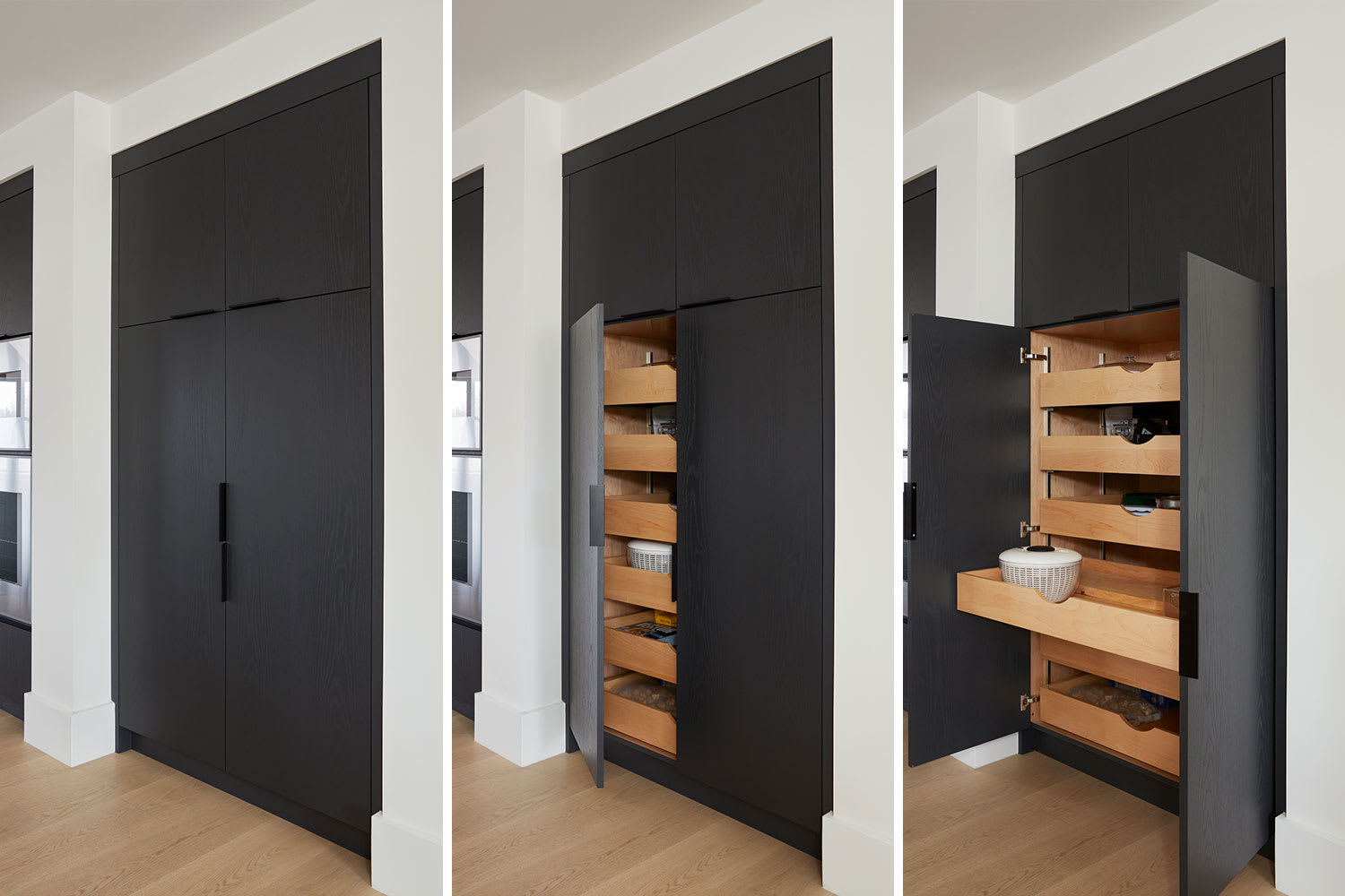 Modern black kitchen pantry cabinet with roll-out drawers