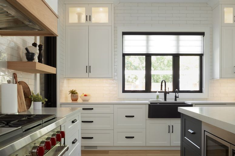 White modern kitchen with under cabinet lights