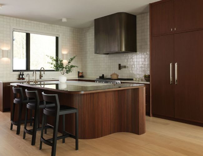 Custom l-shaped walnut kitchen layout