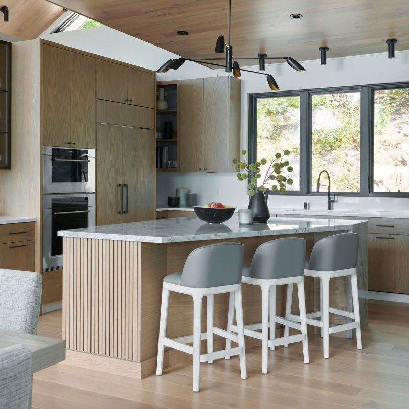 Modern oak kitchen with marble kitchen island