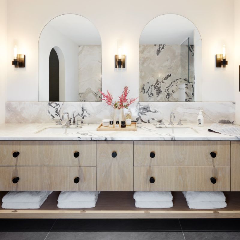 Custom white oak double sink vanity in modern bathroom