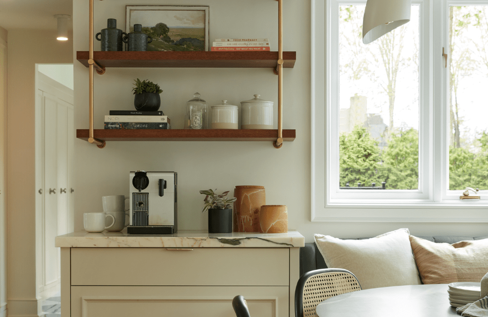 custom coffee bar in a home in oakville with cream and walnut cabinets