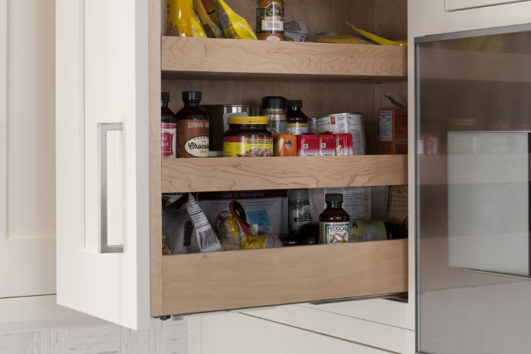 Sliding vertical spice storage built for custom kitchen cabinets